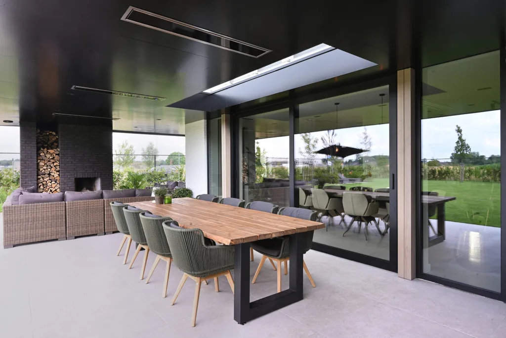 Bromic Platinum electric heaters in a black indoor-outdoor room