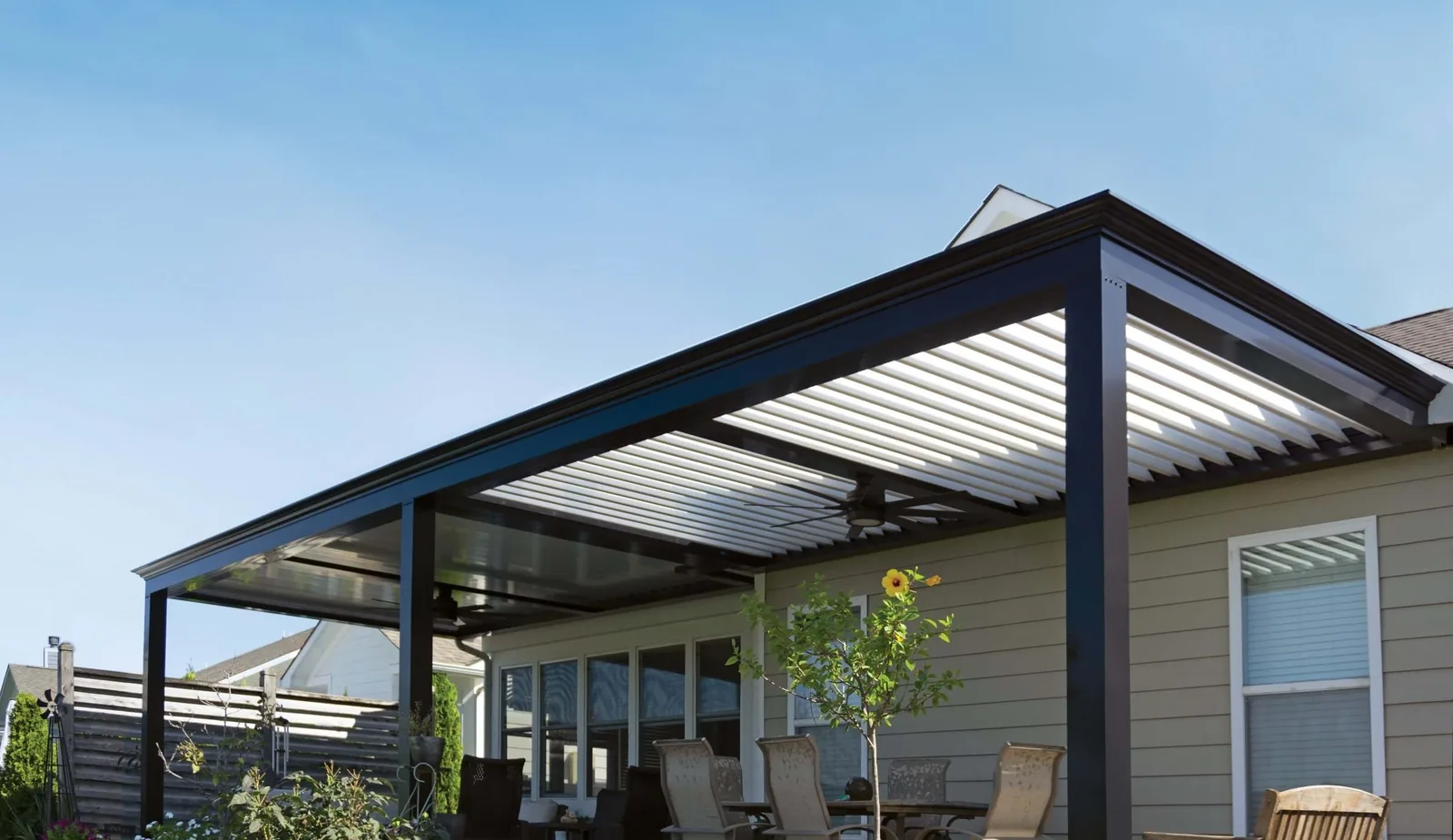 A louvered-roof outdoor living space