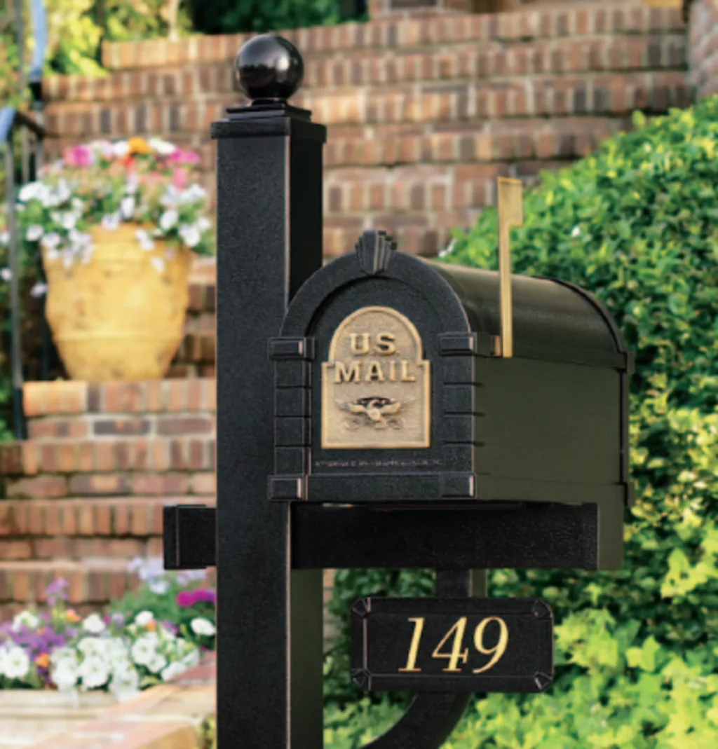 A Gaines post mailbox with an engraved address plaque