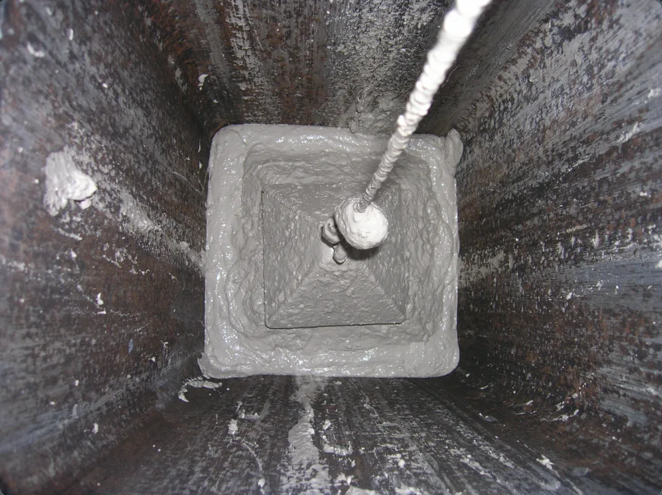 Fireguard sealant being applied inside a chimney flue